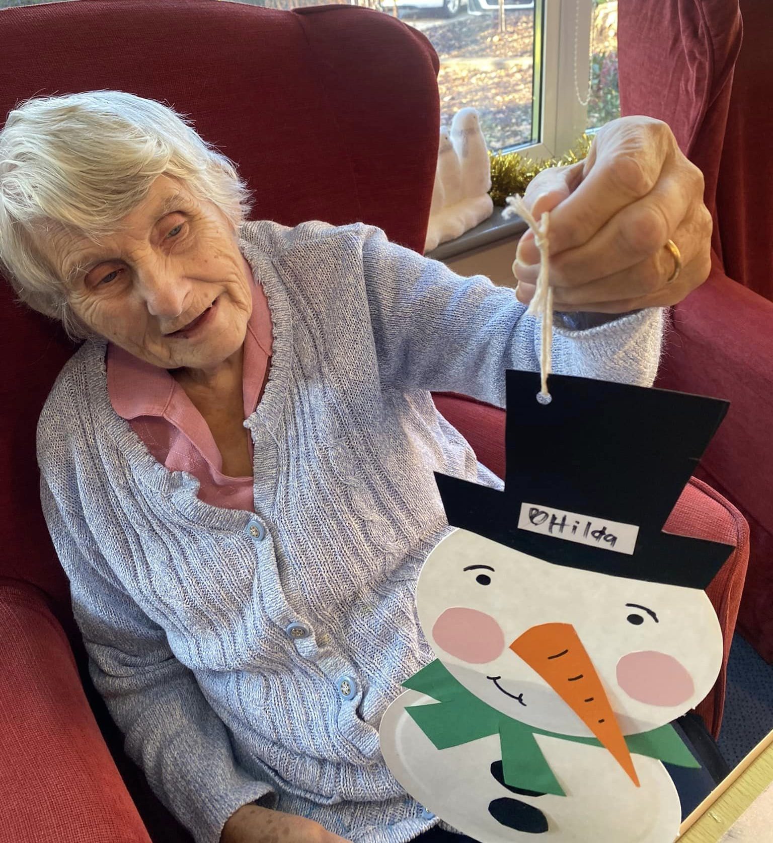 A resident with a Christmas craft