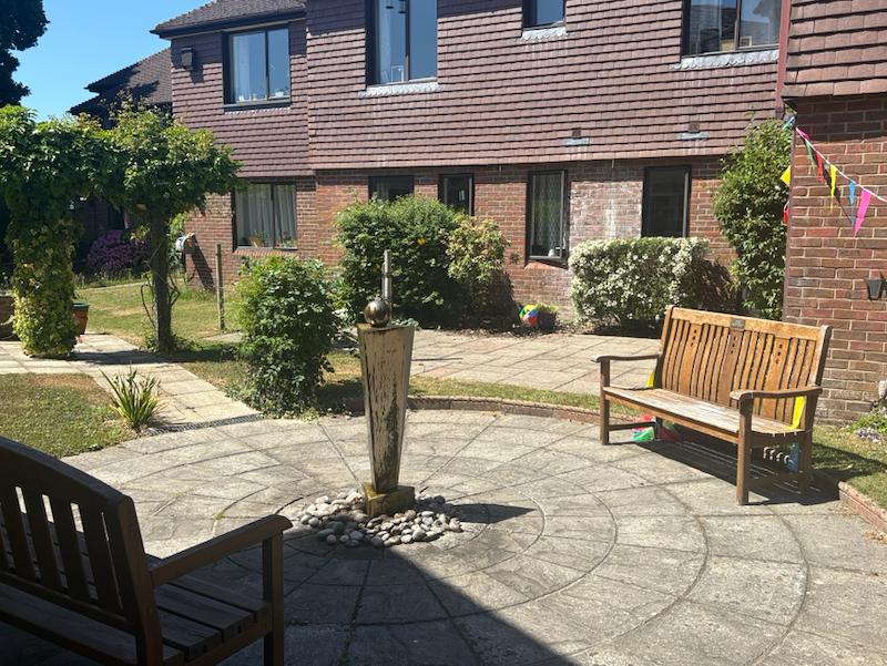 our outdoor areas with benches and a fountain