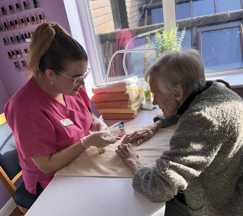 resident choosing out a colour to get their nails painted