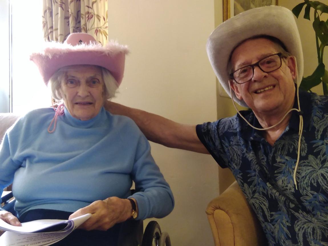 residents wearing cowboy hats