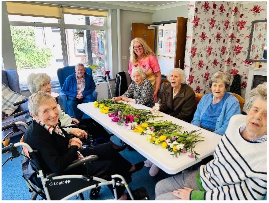 residents and spring flowers