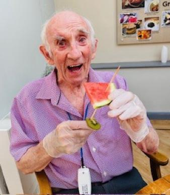 resident enjoying some watermelon