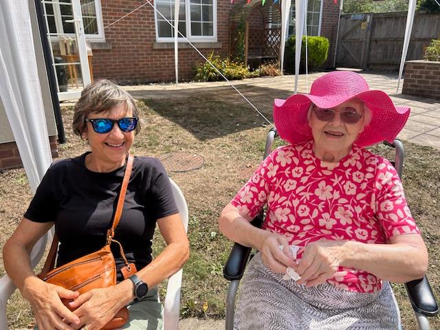 two of our residents sat together at our garden party